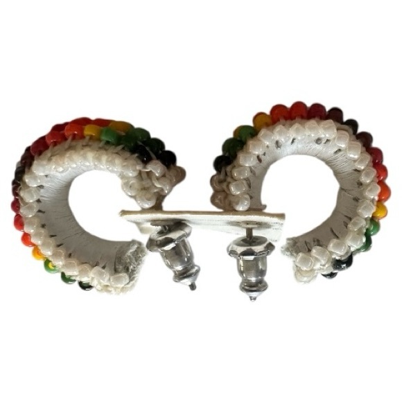 Jewelry - pair of white leather-wrapped rainbow beaded hoop earrings.